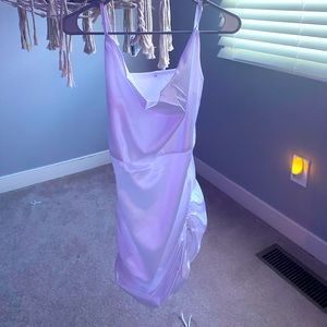 This is a white silky tie dress.